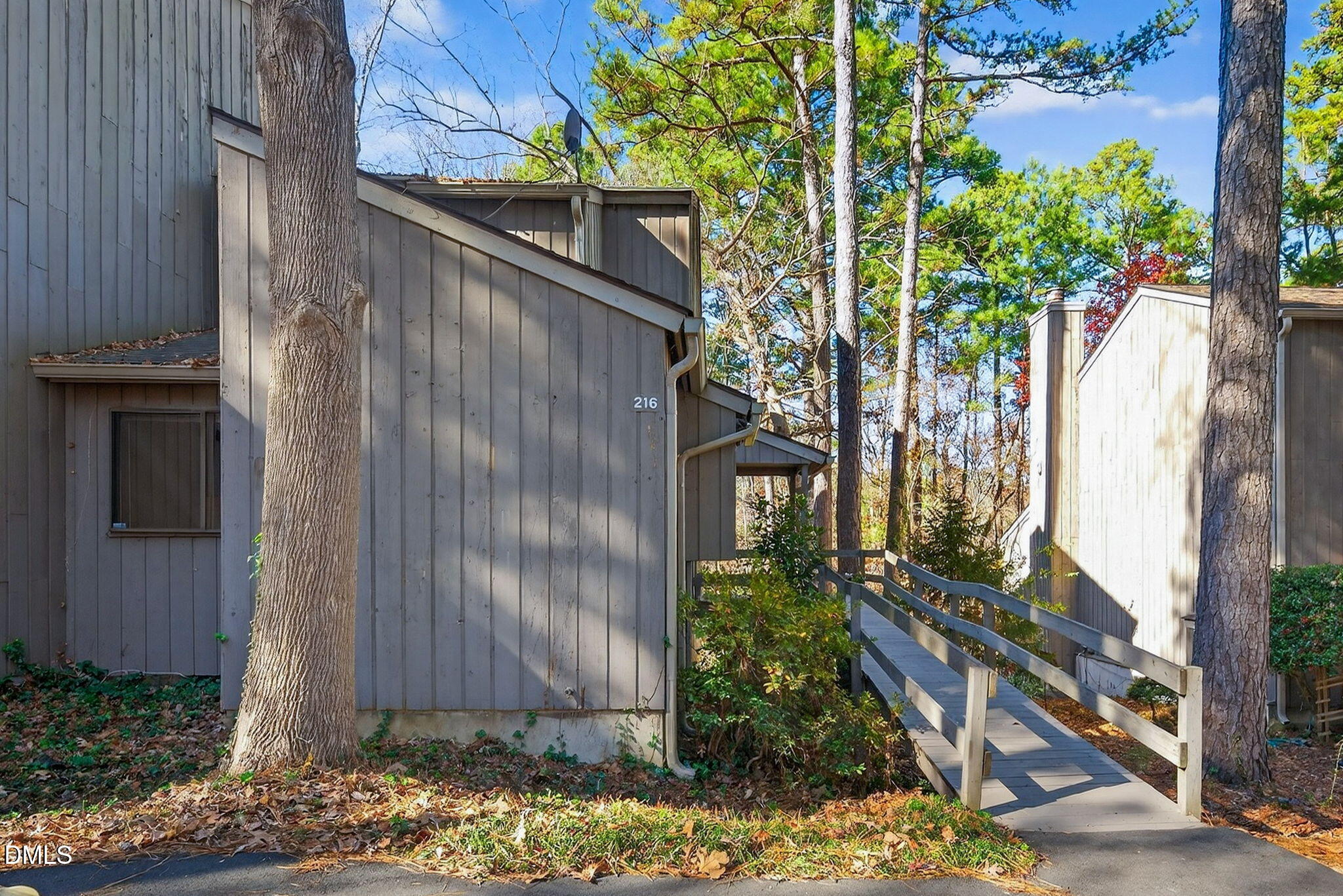 216 Ridge Trail Chapel Hill, NC 27516 - Photo 2 of 30 a backyard of a house with lots of green space