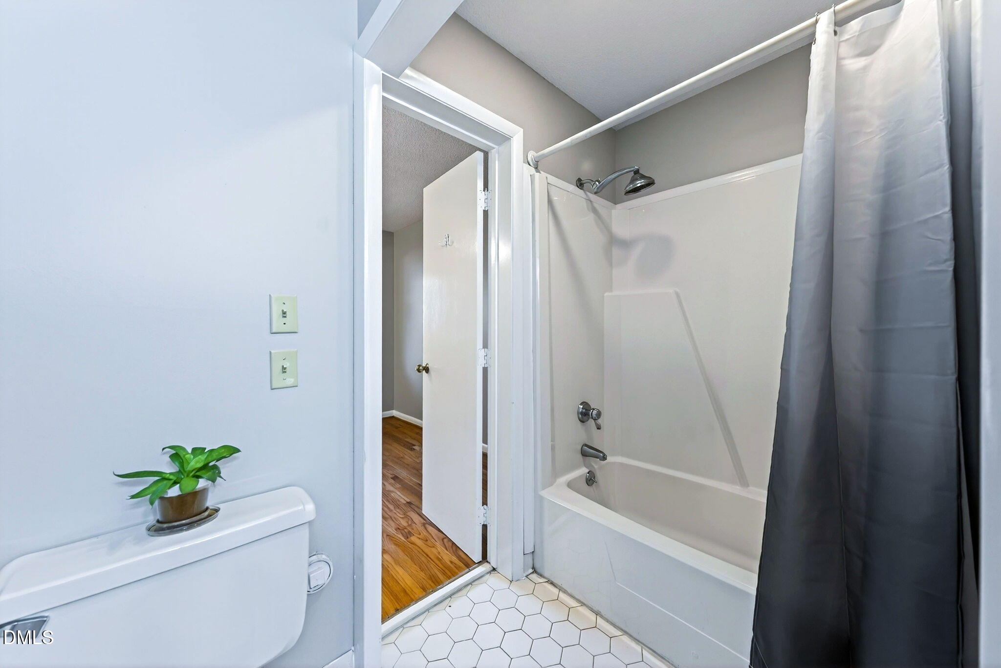 216 Ridge Trail Chapel Hill, NC 27516 - Photo 21 of 30 a bathroom with a bathtub a shower a toilet and a shower