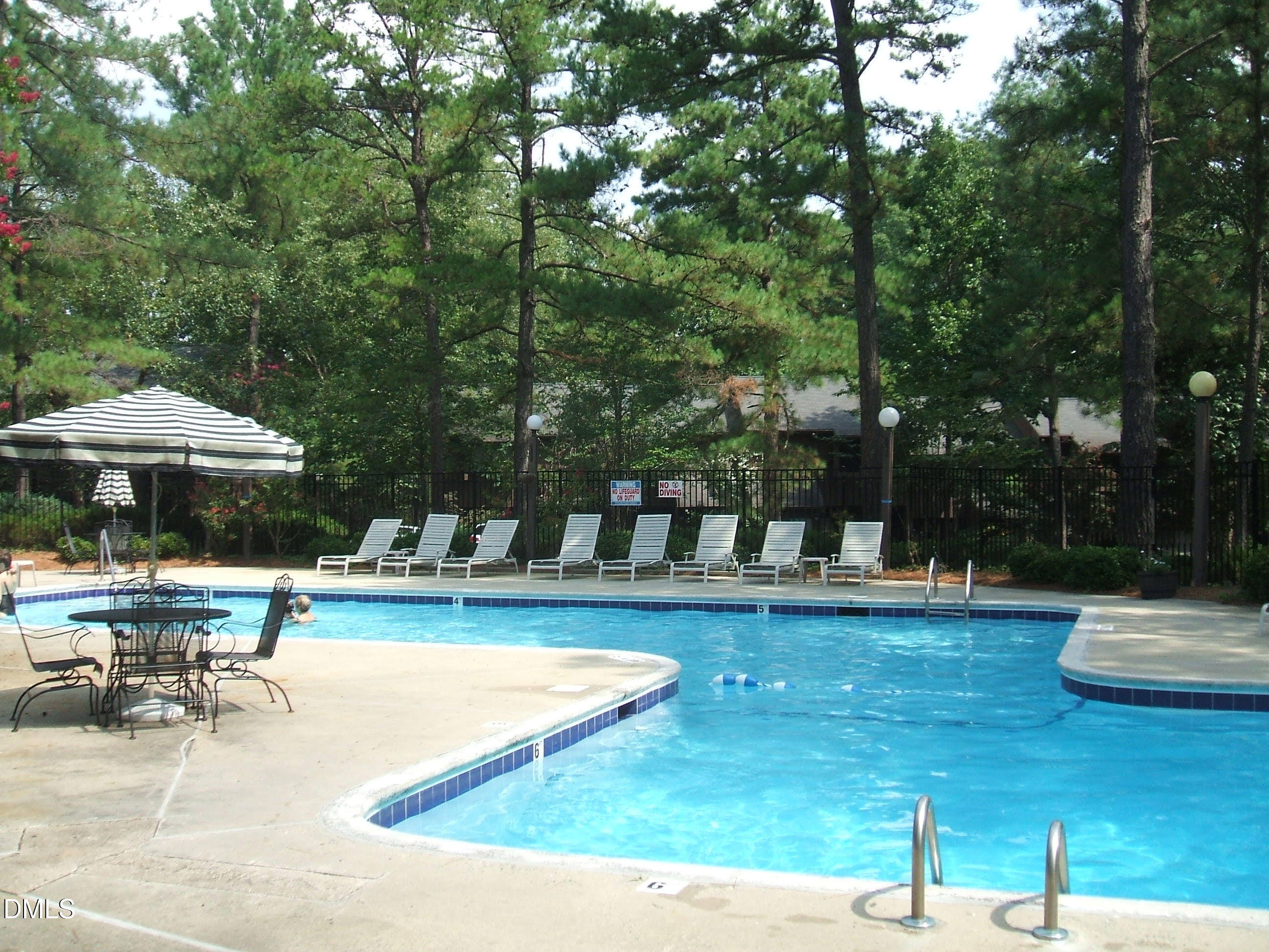 216 Ridge Trail Chapel Hill, NC 27516 - Photo 30 of 30 a view of a swimming pool with chairs