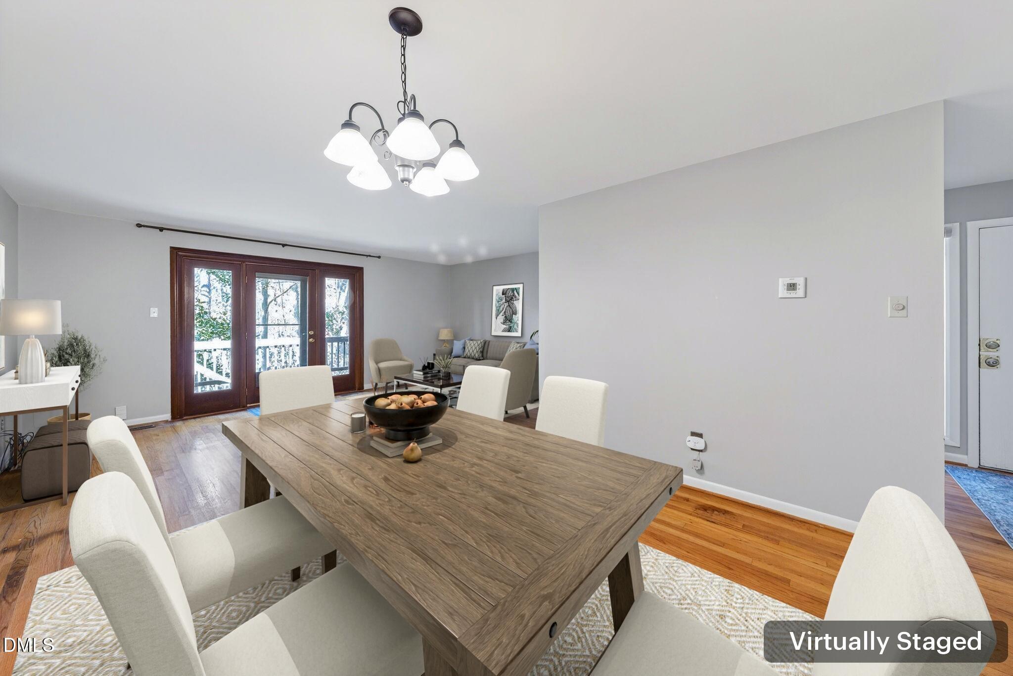 216 Ridge Trail Chapel Hill, NC 27516 - Photo 7 of 30 a view of a dining room with furniture