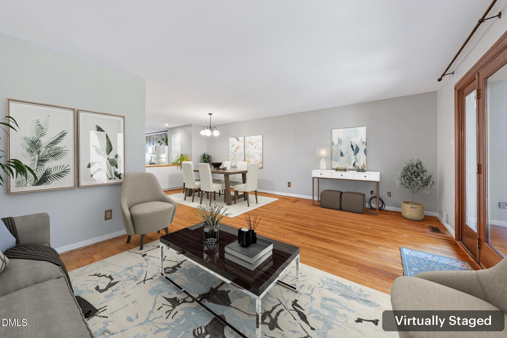 216 Ridge Trail Chapel Hill, NC 27516 - Photo 9 of 30 a living room with furniture and wooden floor