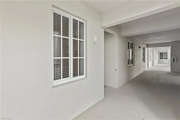 a view of empty room with windows