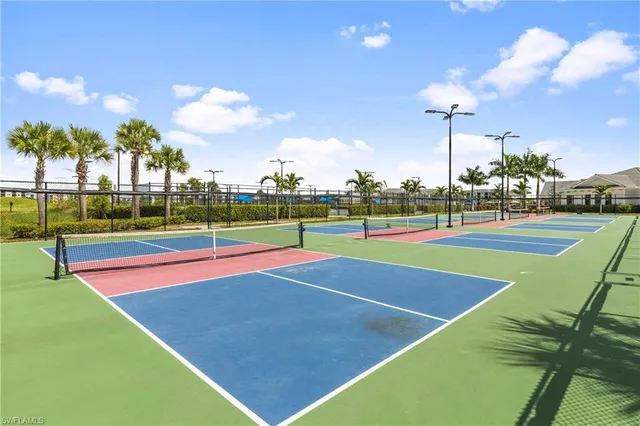 a view of swimming pool with outdoor seating