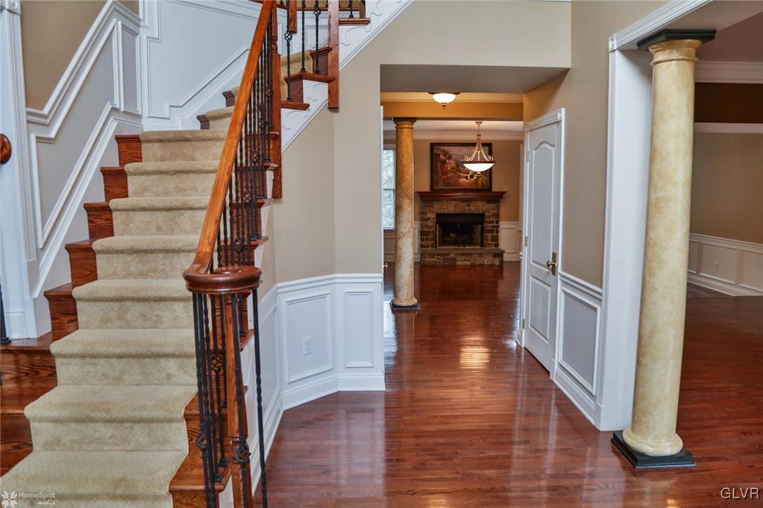 577 Rockbridge Road Nazareth, PA 18064 - Photo 10 of 50 a view of staircase with white walls and wooden floor