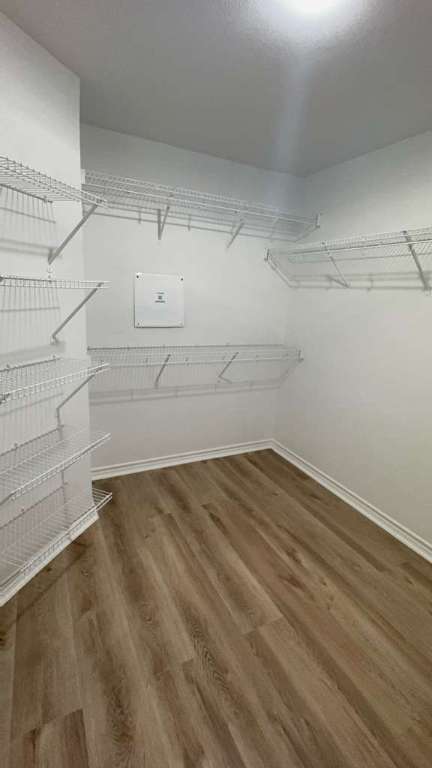 14205 Prairie Sod Lane Elgin, TX 78621 - Photo 11 of 24 a view of a room with racks on the wall