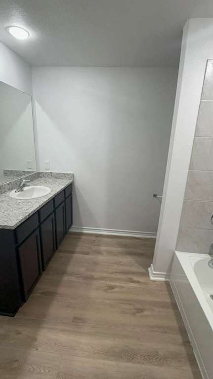 14205 Prairie Sod Lane Elgin, TX 78621 - Photo 13 of 24 a view of a kitchen with a sink and dishwasher