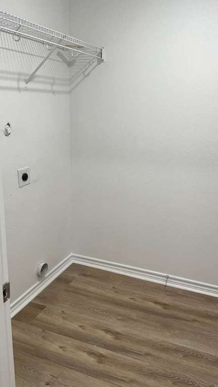 14205 Prairie Sod Lane Elgin, TX 78621 - Photo 22 of 24 a view of a room with empty racks