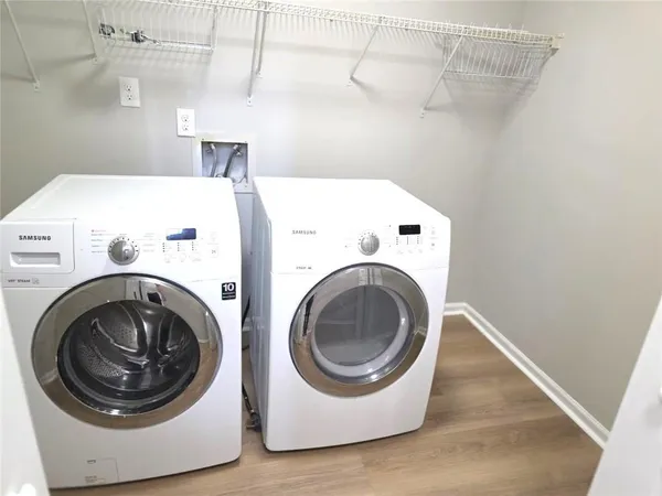 a utility room with dryer and washer