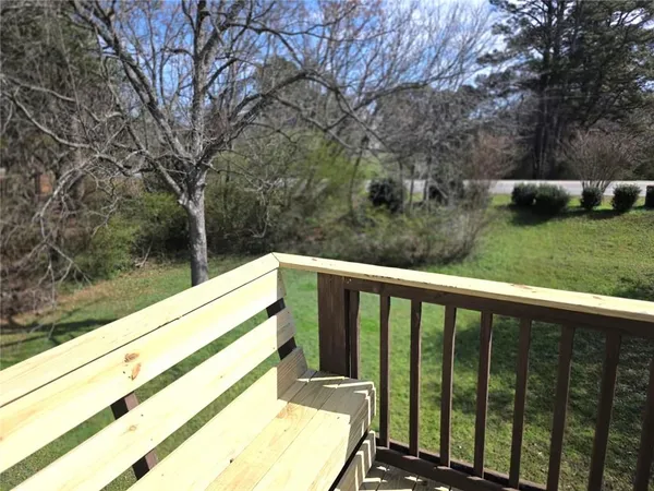 a view of backyard with green space