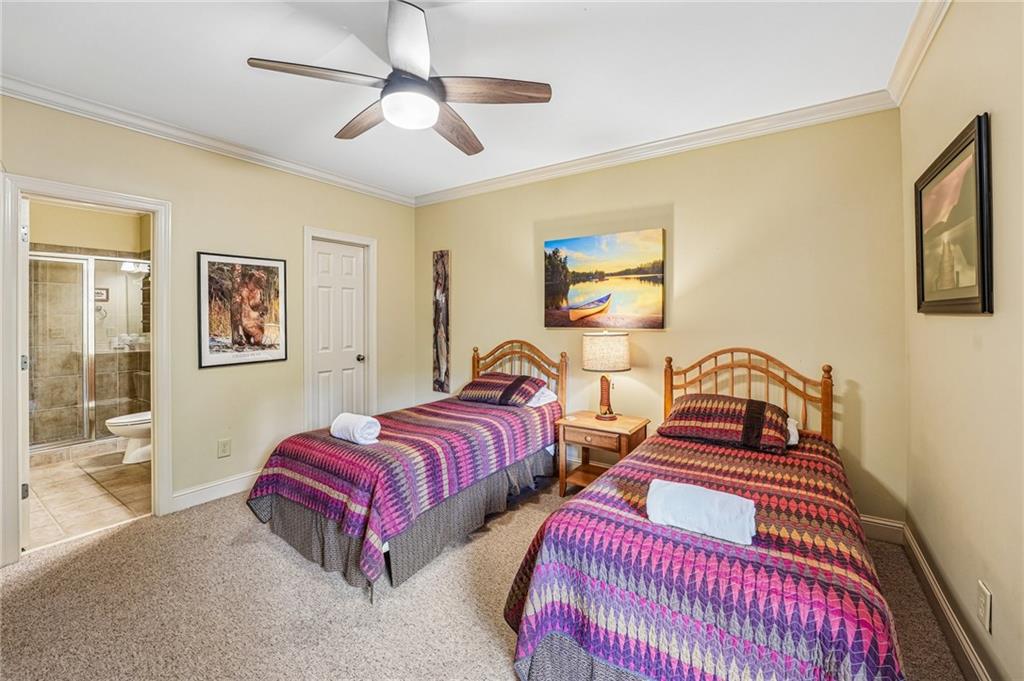 14 Laurel Ridge Lane Big Canoe, GA 30143 - Photo 55 of 72 a bedroom with two beds and painting on the wall