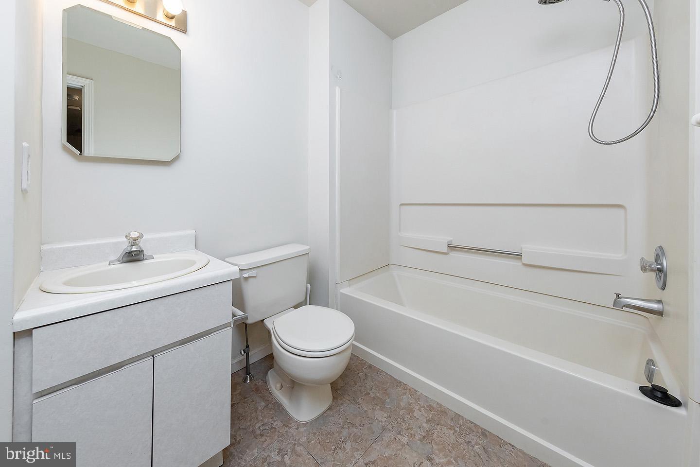 4 Shira Court Mount Holly, NJ 08060 - Photo 12 of 16 a bathroom with a sink toilet and vanity