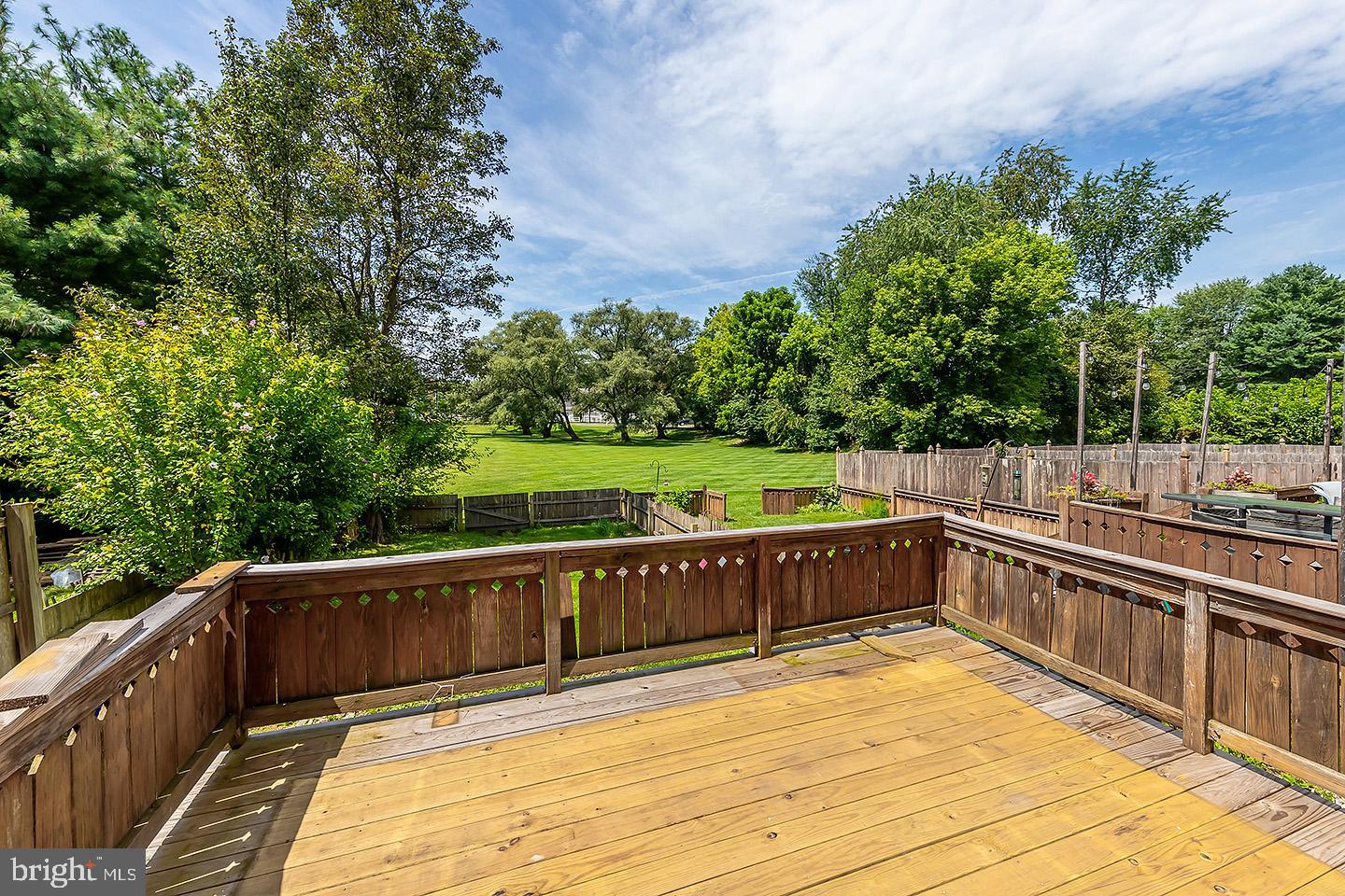 4 Shira Court Mount Holly, NJ 08060 - Photo 14 of 16 a view of deck with chairs and trees