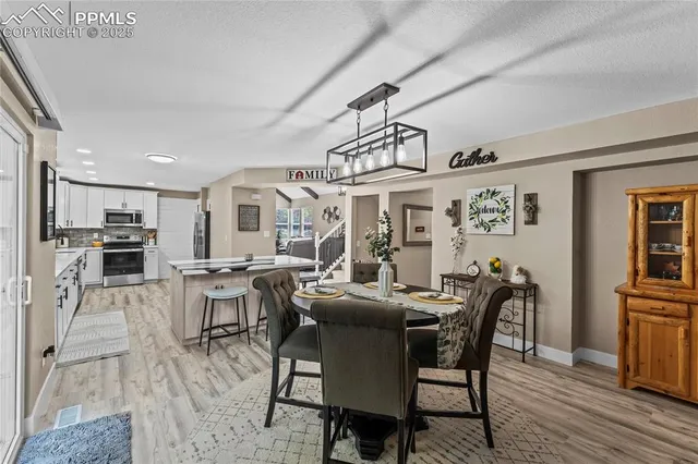 a view of a dining room with furniture