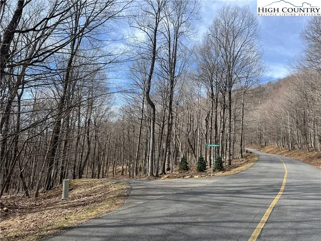 a view of a backyard of the house