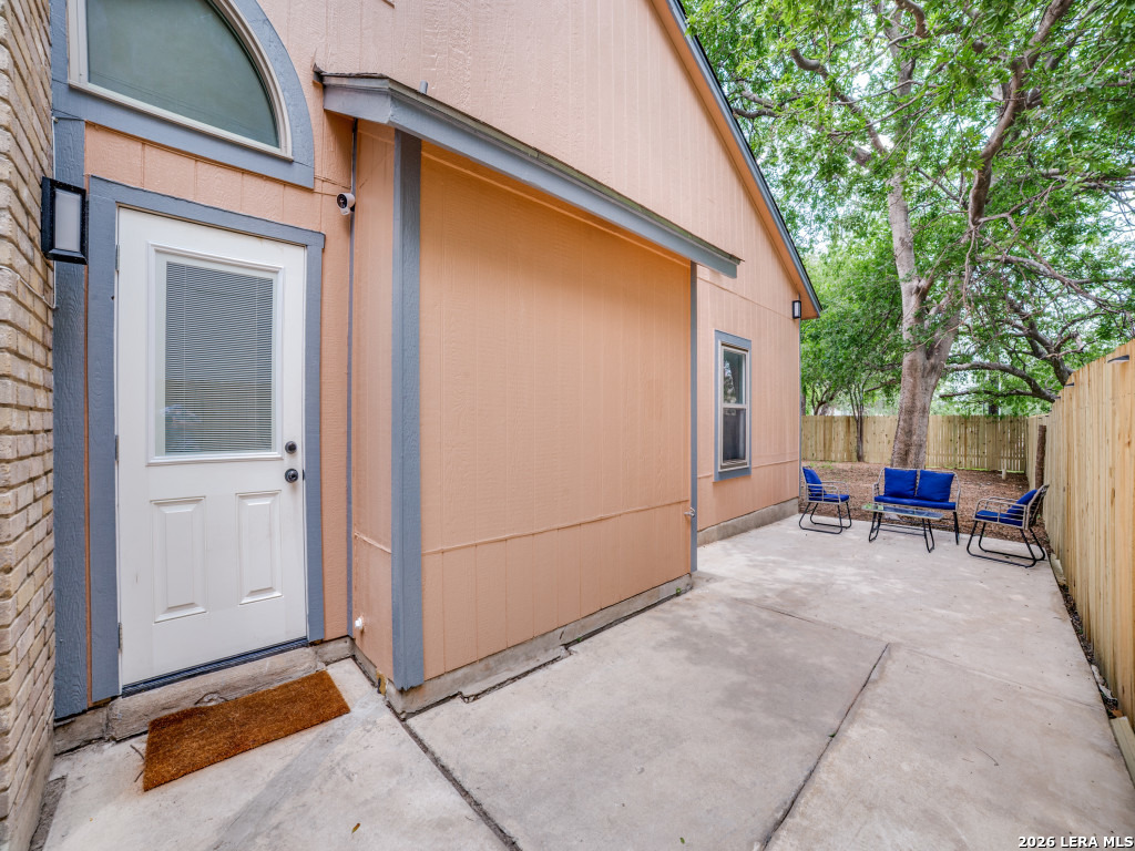 3439 Ridge Ranch San Antonio, TX 78247 - Photo 19 of 25 a view of backyard with outdoor seating and a potted plant