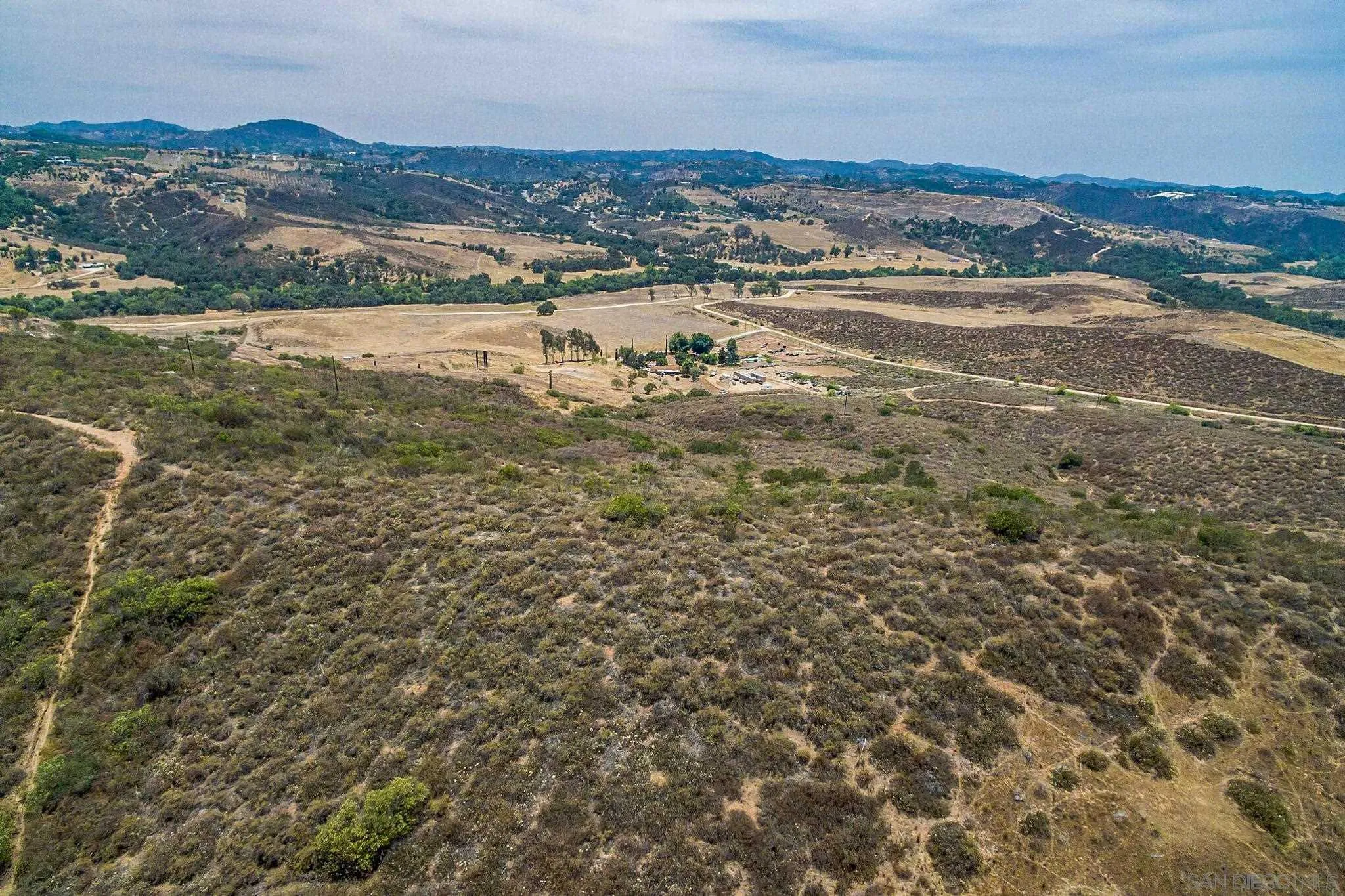 Old Lilac Road, Unit 24 Valley Center, CA 92082 - Photo 21 of 24 a view of an ocean and a mountain