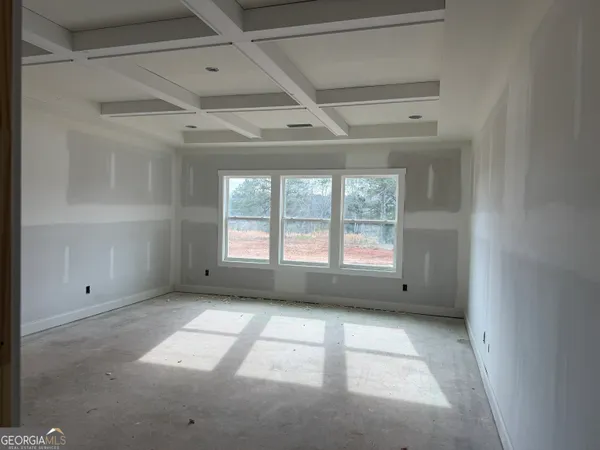 an empty room with windows