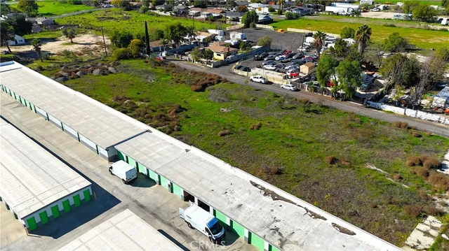 a view of a yard with swimming pool