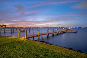 901 Southeast Riverside Drive Stuart, FL 34994 - Photo 15 of 53 a view of a lake with houses
