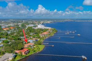 901 Southeast Riverside Drive Stuart, FL 34994 - Photo 18 of 53 a view of a lake with a big yard