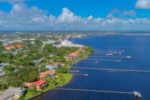901 Southeast Riverside Drive Stuart, FL 34994 - Photo 19 of 53 a view of a lake with a big yard