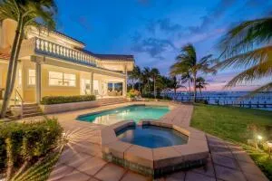 a swimming pool with outdoor seating and yard