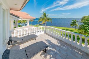901 Southeast Riverside Drive Stuart, FL 34994 - Photo 24 of 53 a view of balcony with furniture