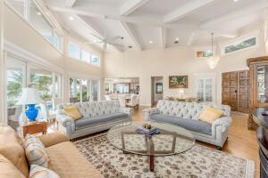 901 Southeast Riverside Drive Stuart, FL 34994 - Photo 33 of 53 a living room with furniture or couch and a large window