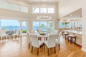 a large kitchen with lots of counter top space and stainless steel appliances