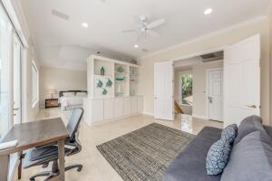 901 Southeast Riverside Drive Stuart, FL 34994 - Photo 49 of 53 a living room with furniture and a table