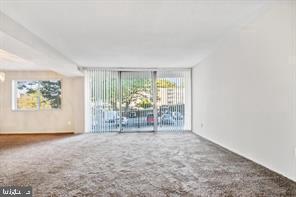 1836 Metzerott Road, Unit 222 Hyattsville, MD 20783 - Photo 7 of 16 a view of room with window and outdoor view