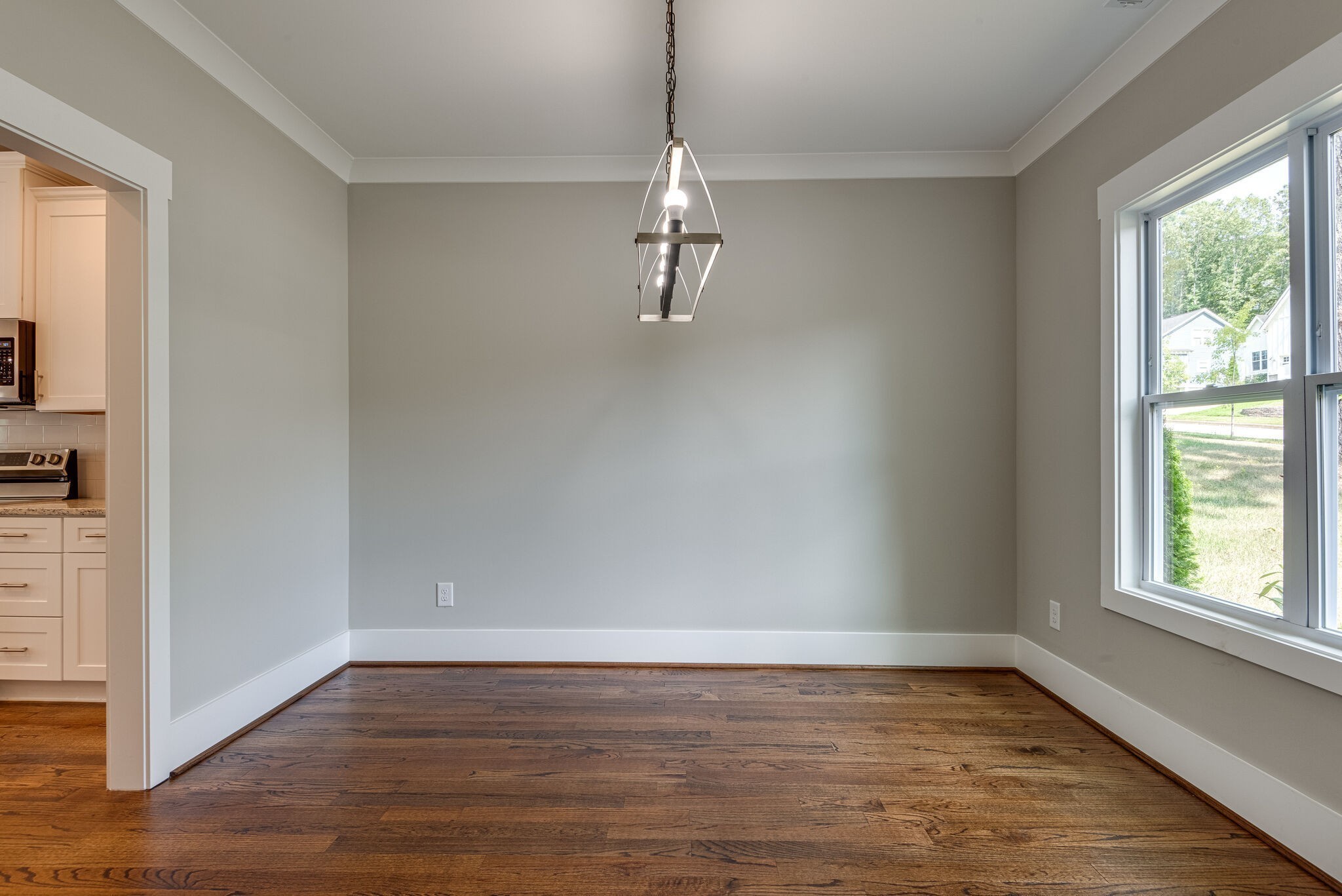 7163 Pepper Tree Circle Fairview, TN 37062 - Photo 19 of 30 a view of an empty room with window and wooden floor