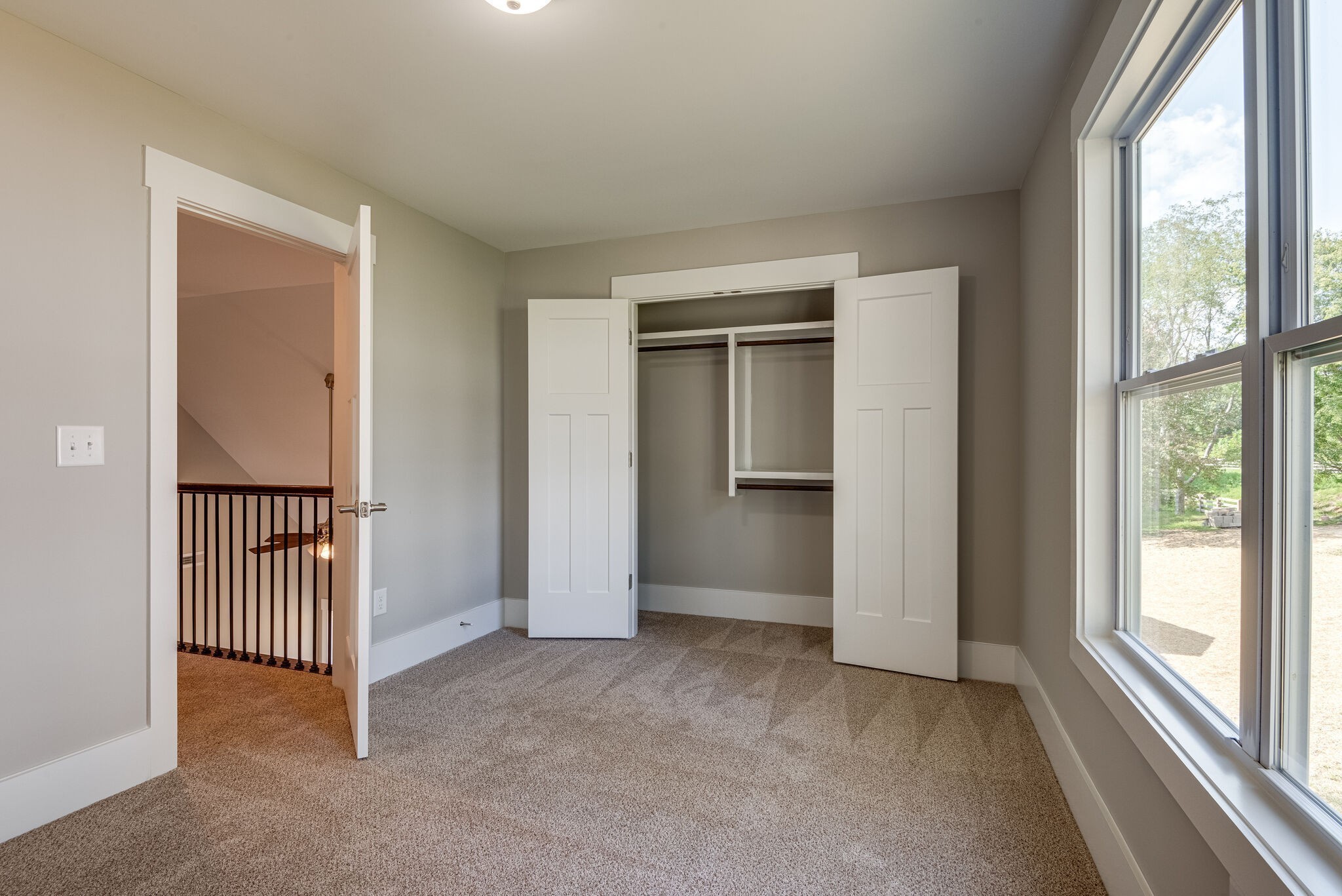 7163 Pepper Tree Circle Fairview, TN 37062 - Photo 25 of 30 a view of a hallway with a window and a livingroom
