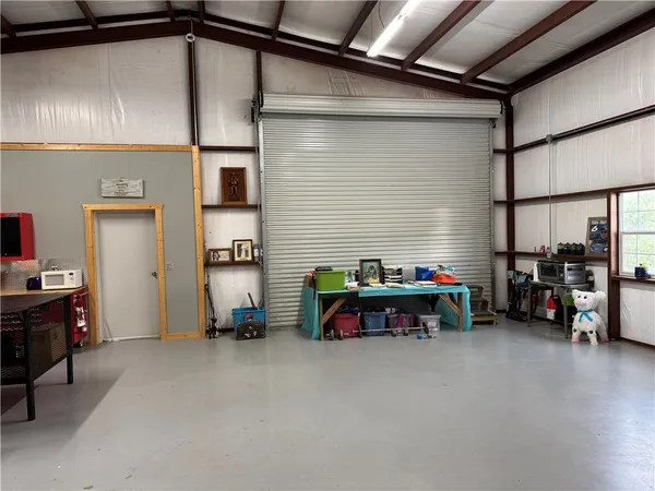 a view of a house with a potted plant and a window