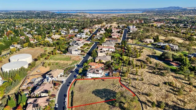 an aerial view of residential house with outdoor space