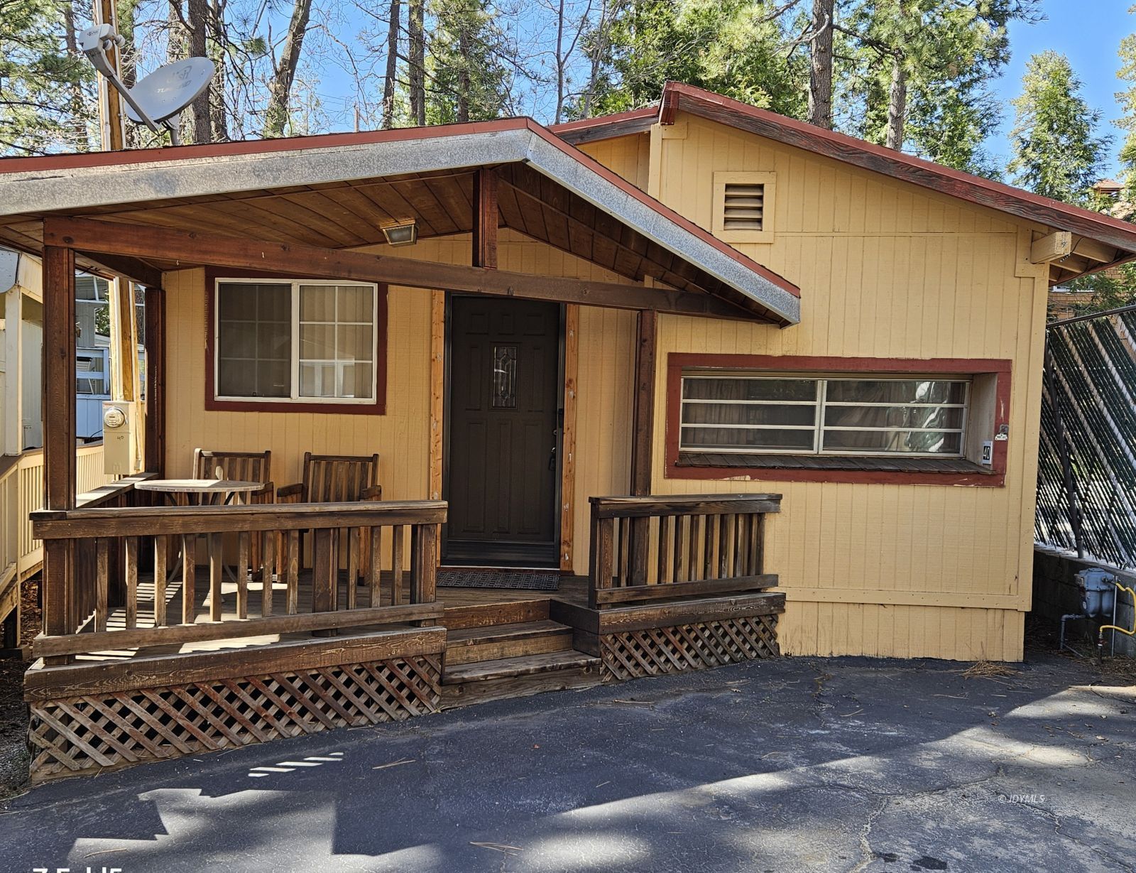 25955 Highway 243, Unit 40 Idyllwild, CA 92549 - Photo 1 of 32 a front view of a house with balcony