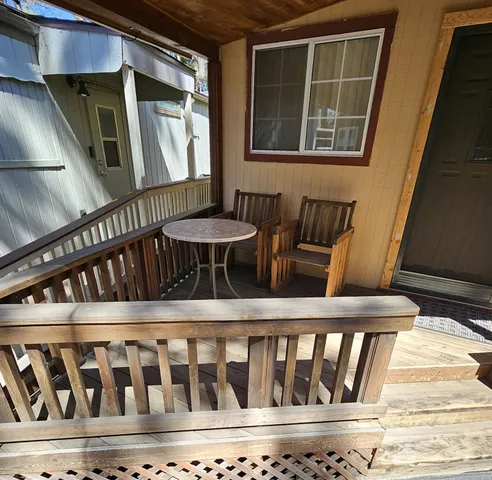 a black and white photo of a living room
