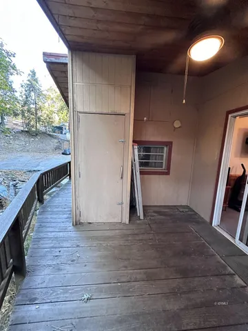 a view of a livingroom with wooden floor