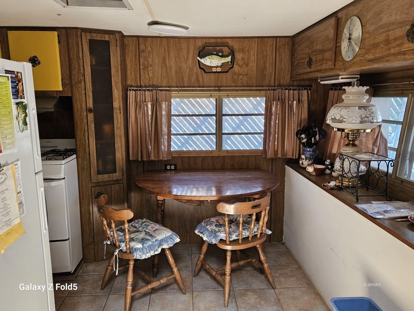 25955 Highway 243, Unit 40 Idyllwild, CA 92549 - Photo 5 of 32 a dining room with furniture and window