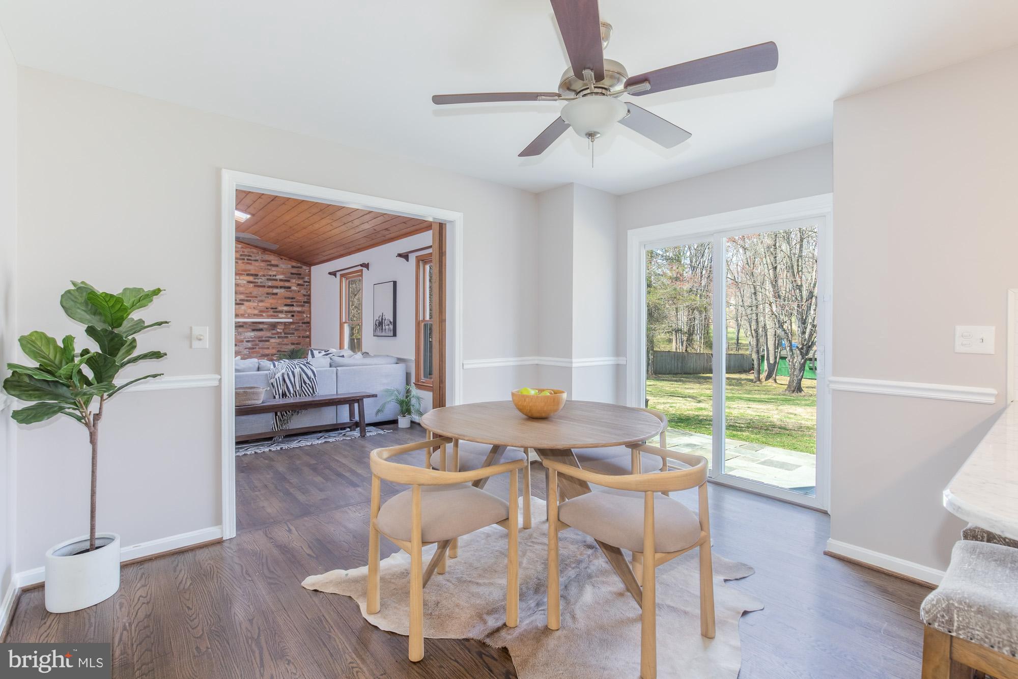 16217 Whitehaven Road Silver Spring, MD 20906 - Photo 20 of 50 a living room with furniture and a large window