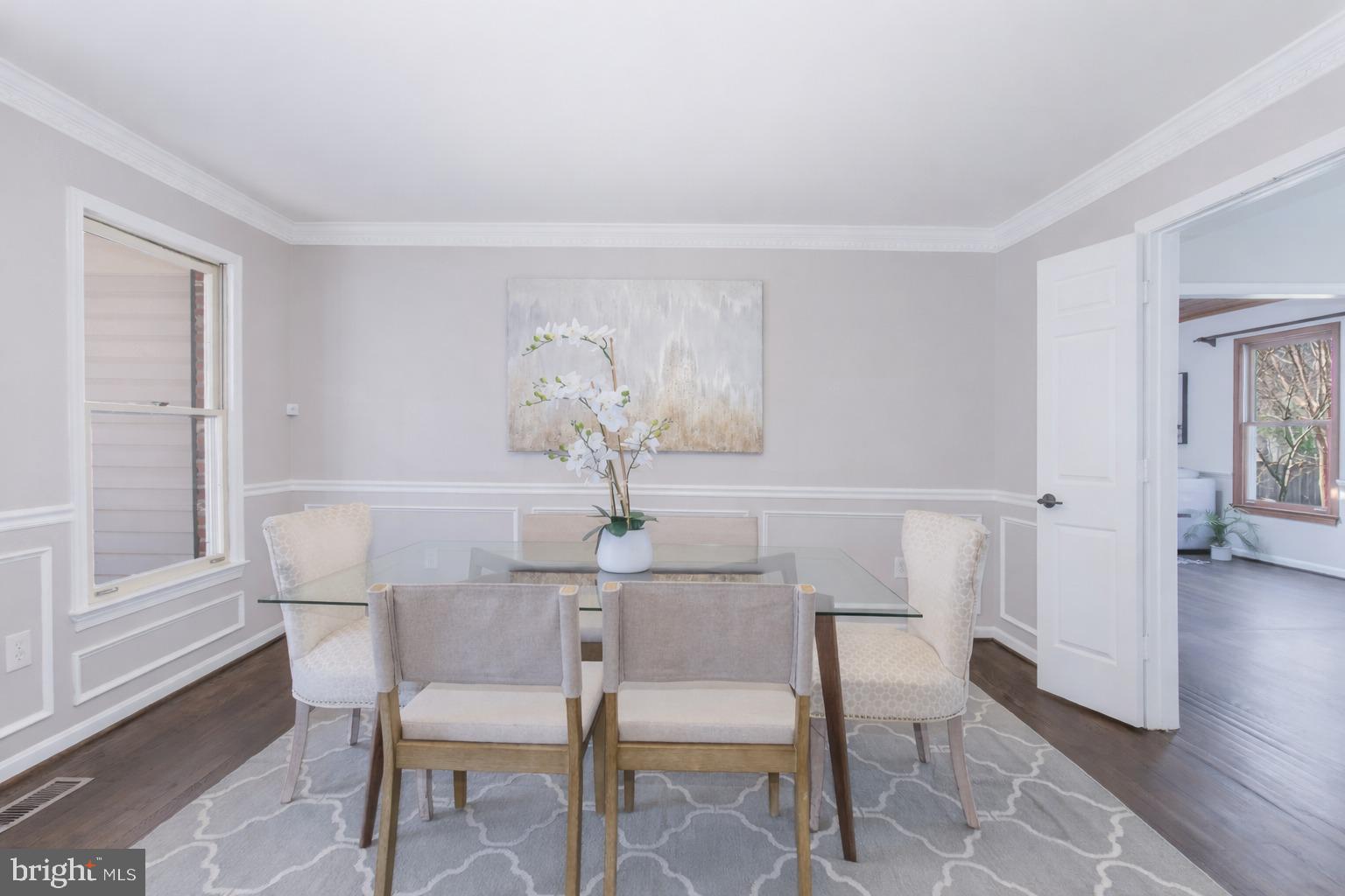 16217 Whitehaven Road Silver Spring, MD 20906 - Photo 23 of 50 a dining room with furniture and wooden floor