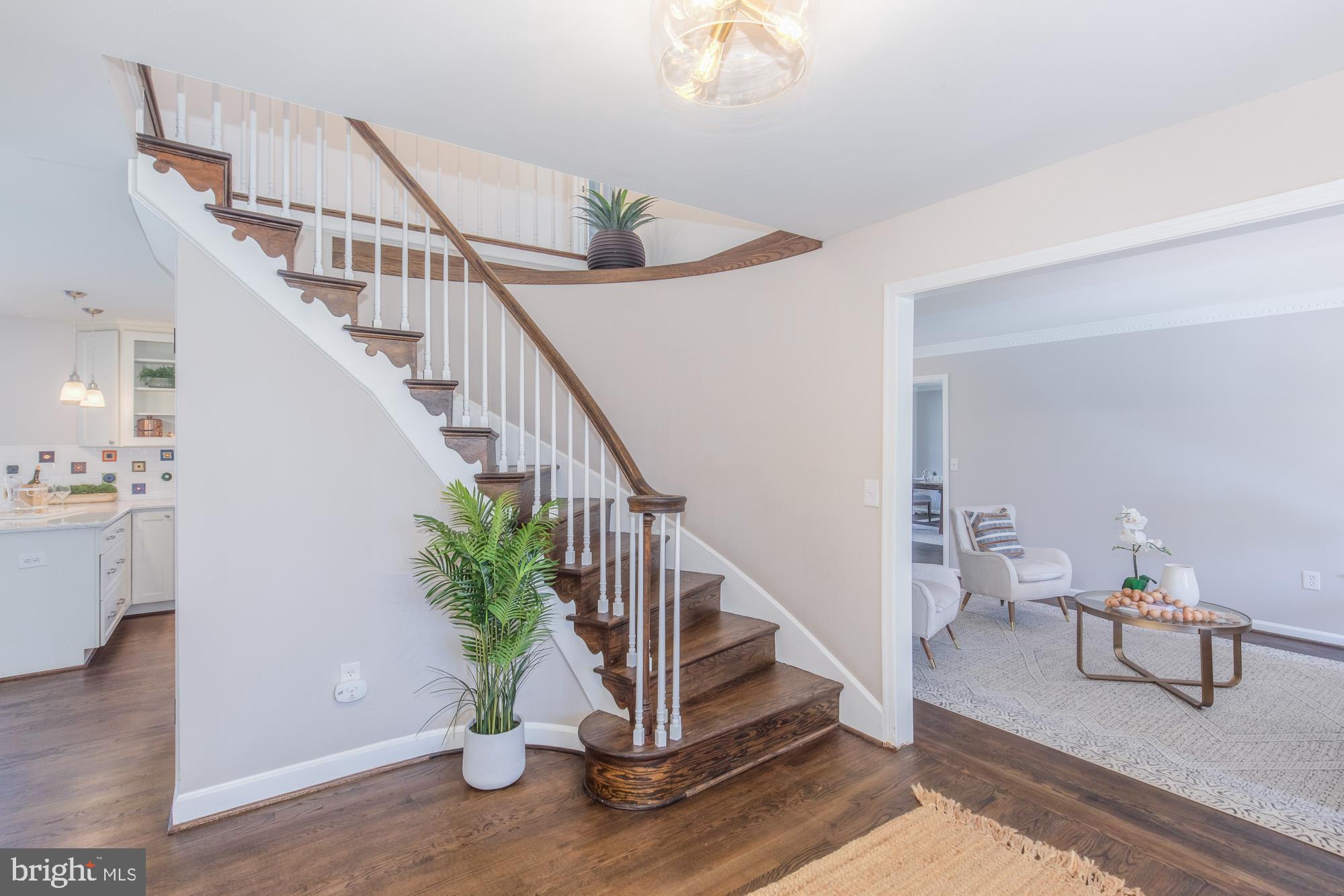 16217 Whitehaven Road Silver Spring, MD 20906 - Photo 3 of 50 a view of entryway and hall with wooden floor