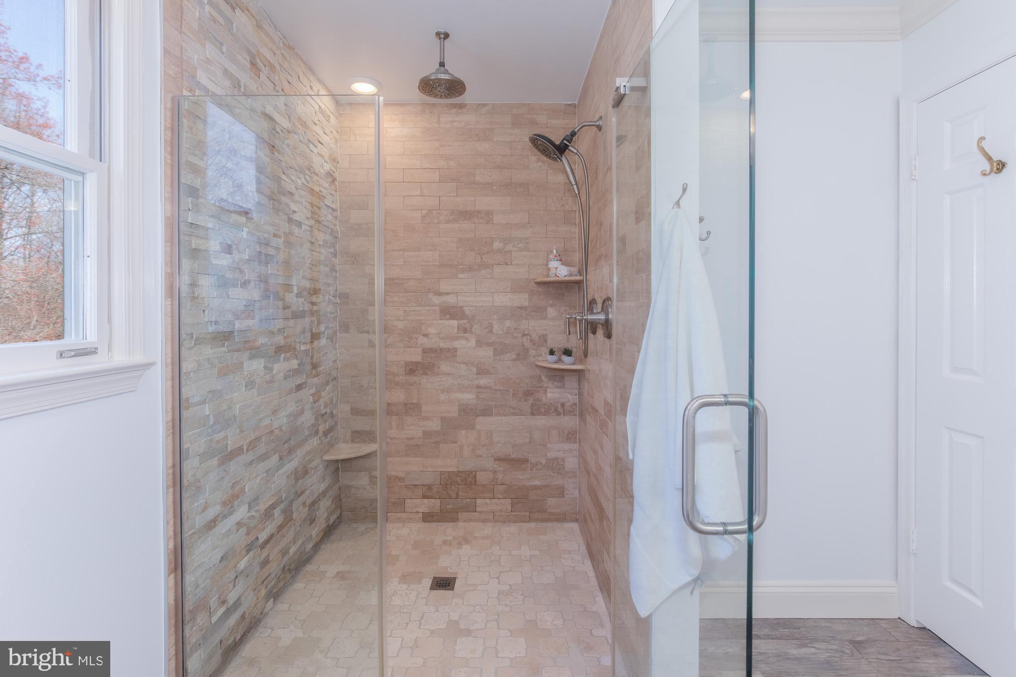 16217 Whitehaven Road Silver Spring, MD 20906 - Photo 35 of 50 a bathroom with a shower