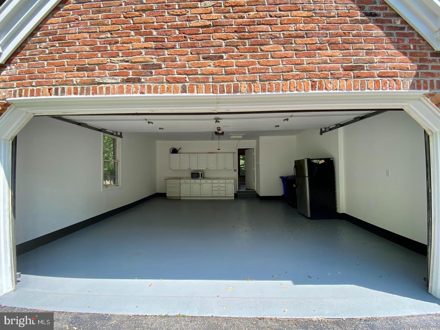 16217 Whitehaven Road Silver Spring, MD 20906 - Photo 46 of 50 a view of a car garage