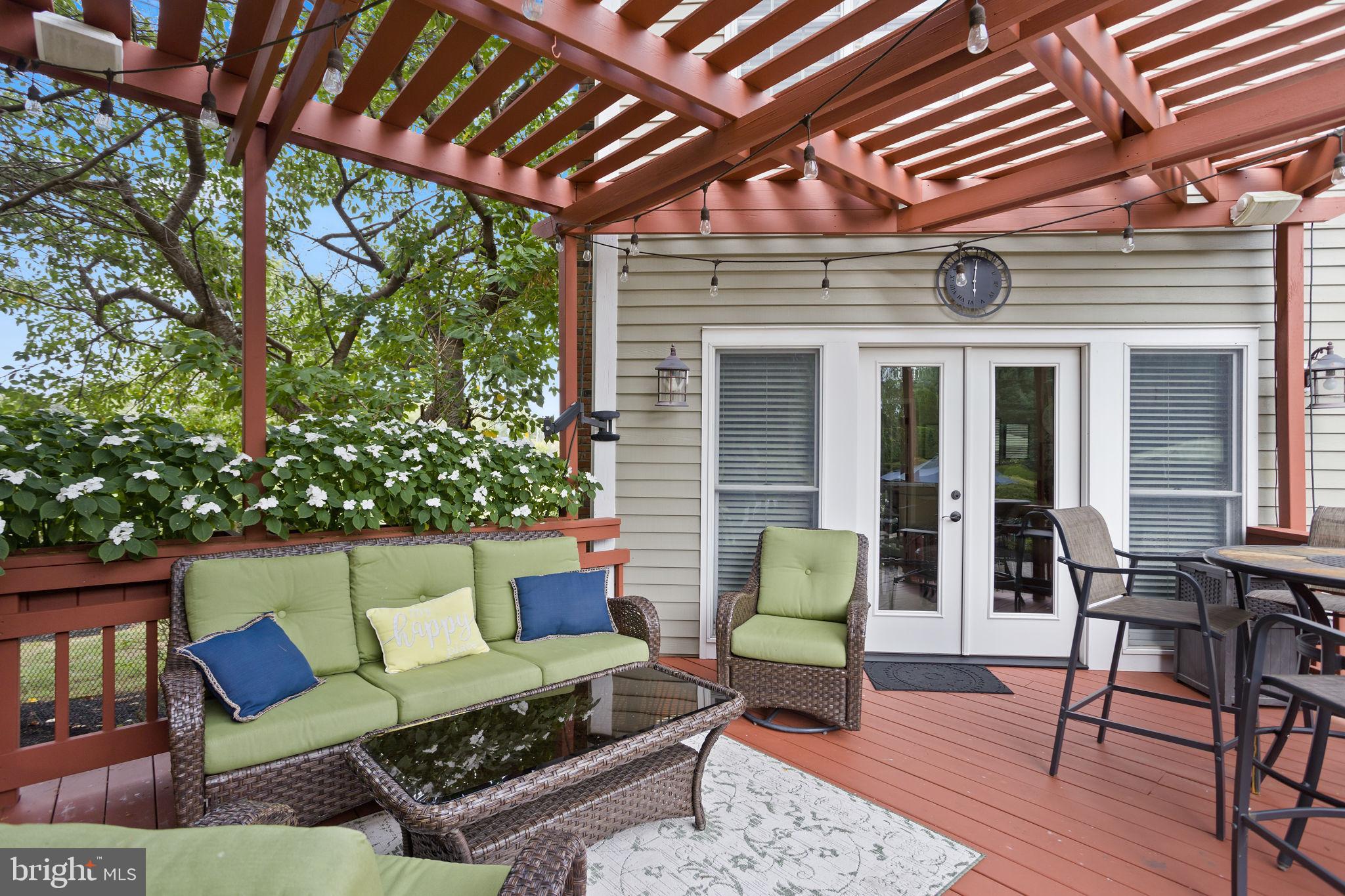 44 Walters Road Robbinsville, NJ 08691 - Photo 47 of 68 a outdoor living space with furniture and a fireplace