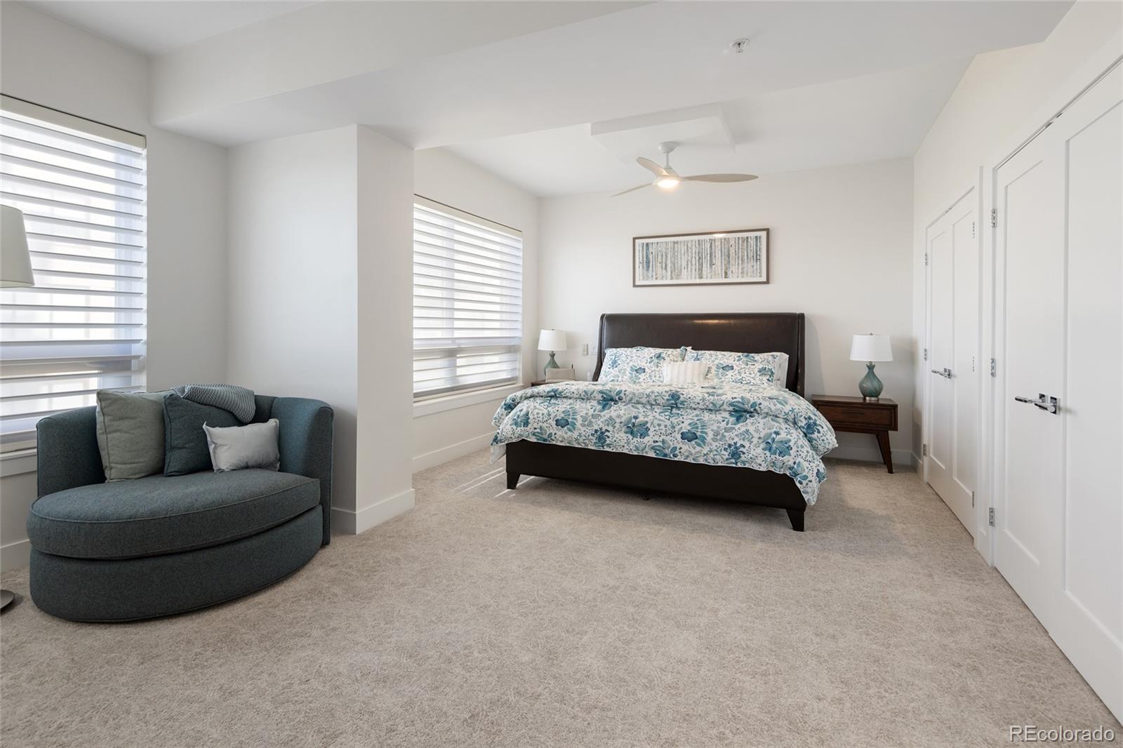 1650 Fillmore Street, Unit 1107 Denver, CO 80206 - Photo 27 of 49 a bedroom with bed and window