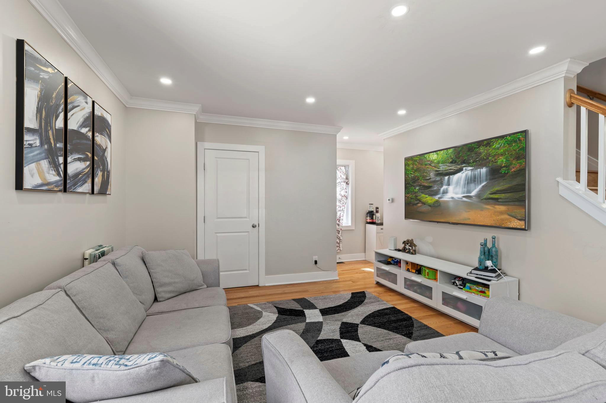 1901 Jackson Street Cinnaminson, NJ 08077 - Photo 11 of 40 a living room with furniture and a flat screen tv
