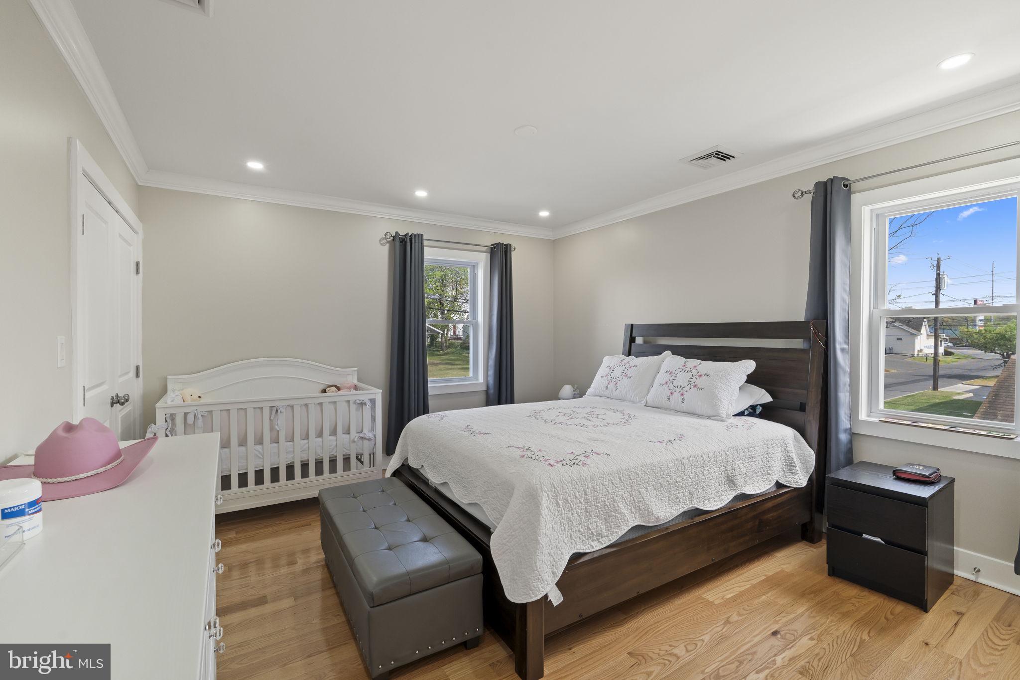 1901 Jackson Street Cinnaminson, NJ 08077 - Photo 13 of 40 a bedroom with a bed and a window
