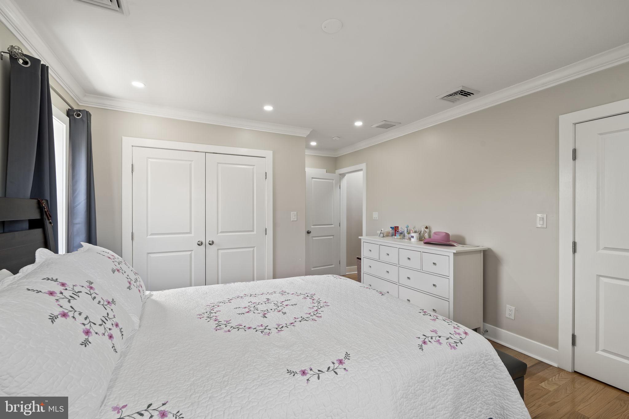 1901 Jackson Street Cinnaminson, NJ 08077 - Photo 15 of 40 a bedroom with a bed and a dresser