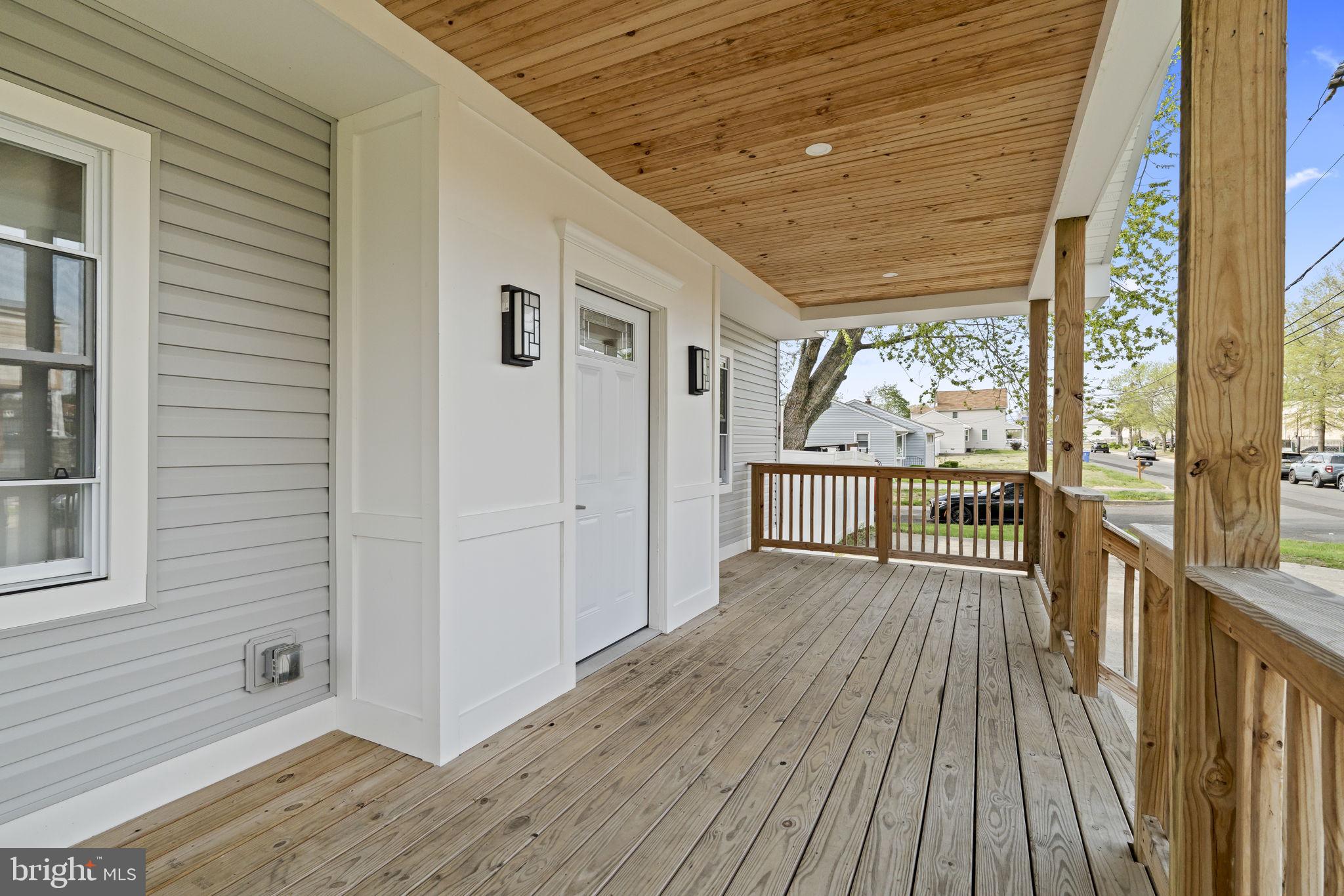 1901 Jackson Street Cinnaminson, NJ 08077 - Photo 2 of 40 a view of a balcony with wooden floor